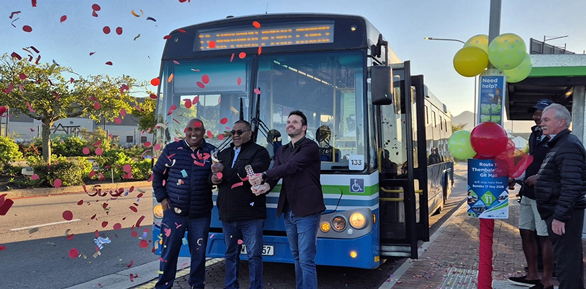 GO GEORGE Manager Morné Lakay, George Link Director John Heathcote, and Garden Route District Municipality Executive Mayor Alderman Marais Kruger pop confetti cannons in front of a GO GEORGE bus at the official launch of Route 11 between Thembalethu and the Garden Route Mall on Sunday, 17 May 2026.